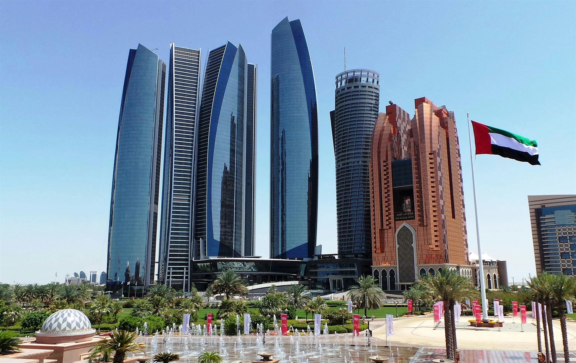 Abu Dhabi Etihad Towers and UAE flag
